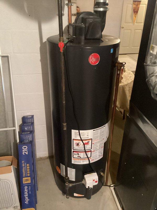 Completed inspection of existing Rheem water heater system and basement moisture issues. Provided customer with detailed estimates for both traditional tank and tankless water heater replacement options. Also assessed sump pump system requiring replacement due to visible water damage along basement wall perimeter.