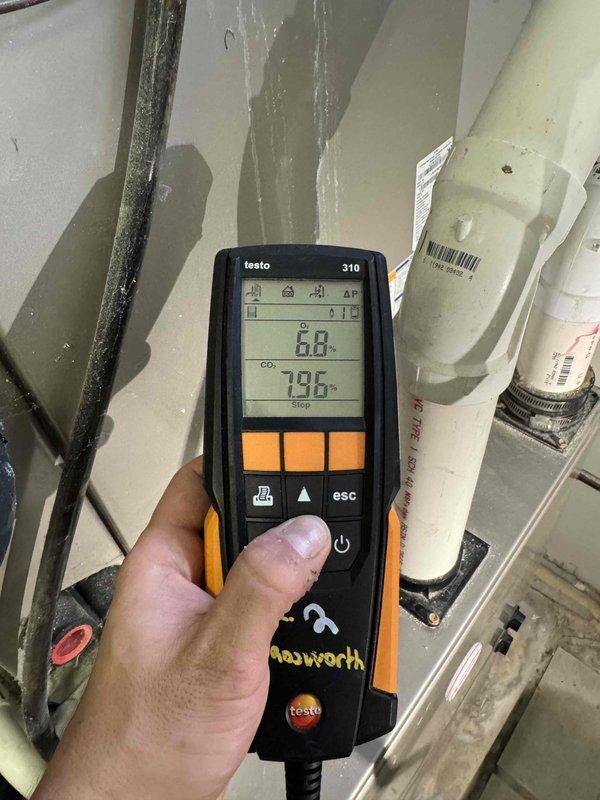 Performed routine heating system maintenance including inspection of igniter assembly for proper condition and function. Conducted combustion analysis using Testo 310 analyzer, confirming optimal operation with readings of 6.8/7.9.6 within manufacturer specifications. System now operating at peak efficiency with no issues identified.