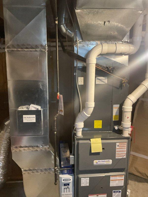Performed routine HVAC heating maintenance on a P.K. Wadsworth furnace system located in basement utility area. Inspected interior components including blower motor assembly, circuit board, and wiring connections - all found in normal working condition. Customer requested quote for furnace humidifier addition, which will be provided separately.