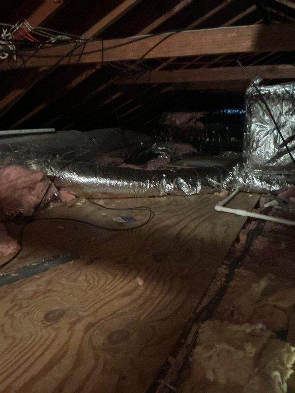 Responded to no-heat call and inspected furnace system. Opened access panel to examine blower motor assembly, circuit board, and electrical components. Visually inspected attic ductwork and insulation to ensure proper installation and airflow.