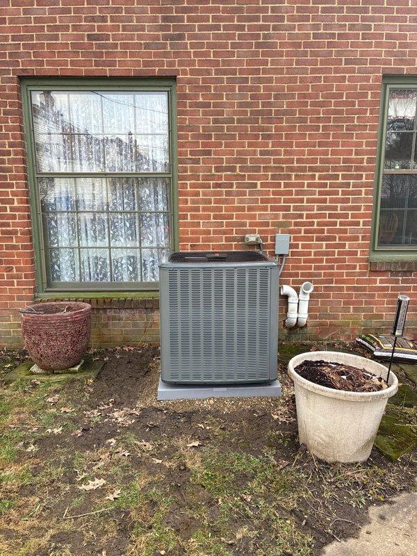 Successfully installed complete Amana HVAC system including 96% efficiency furnace, AC unit, and water panel. System includes properly connected PVC venting, copper lines, and all required control wiring with exterior condenser placed on concrete pad.