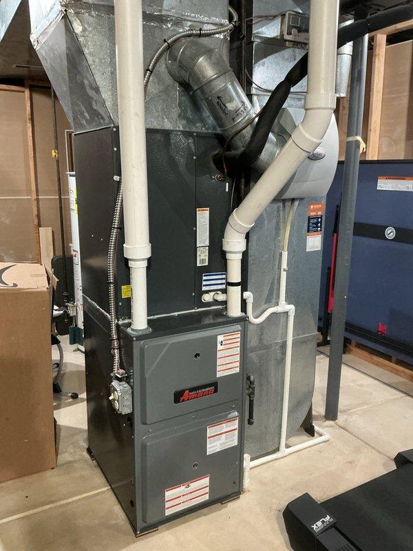 Performed scheduled heating maintenance on Amana furnace system. Conducted differential pressure testing with manometer showing 35.1, verifying proper combustion and ventilation. Inspected all components including ductwork, PVC intake/exhaust venting, and associated equipment; system functioning within normal parameters.