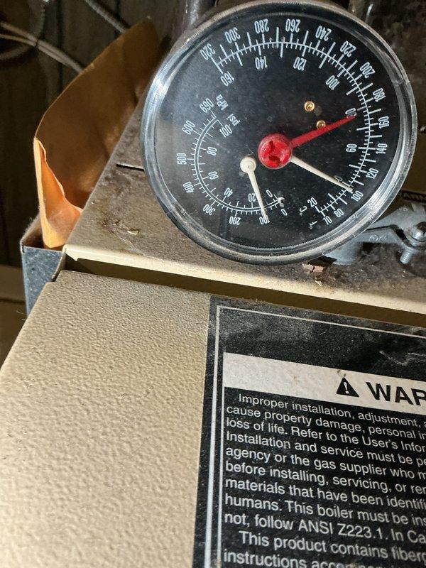 Performed scheduled maintenance on boiler system. Inspected pressure gauge readings and confirmed proper operation within normal range. Examined expansion tank and associated copper piping for leaks and proper installation; all components functioning correctly.