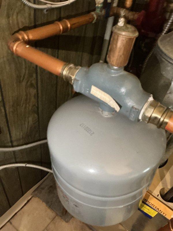 Performed scheduled maintenance on boiler system. Inspected pressure gauge readings and confirmed proper operation within normal range. Examined expansion tank and associated copper piping for leaks and proper installation; all components functioning correctly.