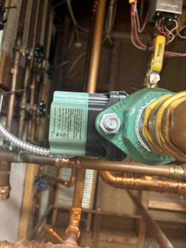 Performed routine maintenance on water boiler system. Inspected circulation pump and associated copper piping connections. Conducted combustion analysis with Testo 310 analyzer, confirming proper oxygen levels (9.9%) and minimal carbon monoxide presence (1 ppm), indicating efficient system operation.