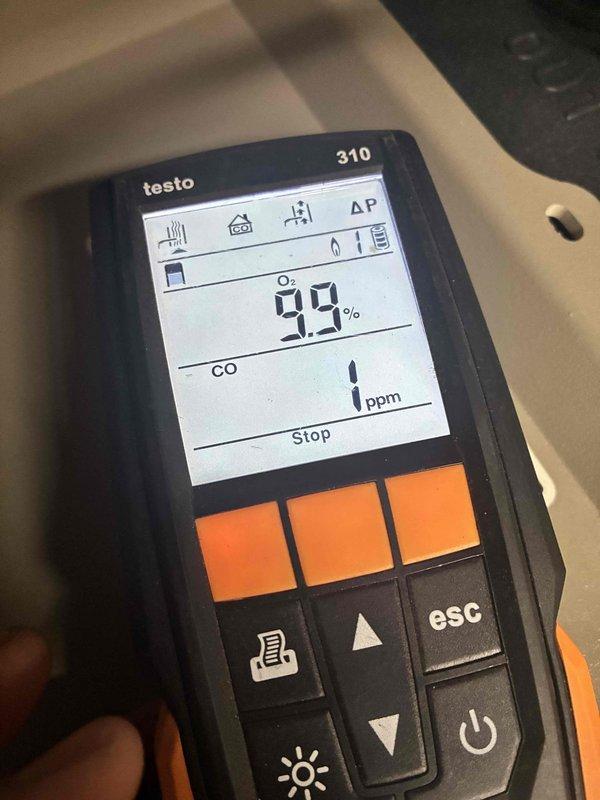 Performed routine maintenance on water boiler system. Inspected circulation pump and associated copper piping connections. Conducted combustion analysis with Testo 310 analyzer, confirming proper oxygen levels (9.9%) and minimal carbon monoxide presence (1 ppm), indicating efficient system operation.