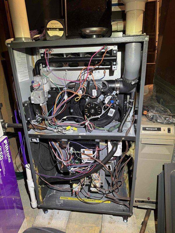 Performed scheduled heating maintenance on furnace system. Conducted comprehensive inspection of internal components including electrical connections, control boards, and fan assembly. Utilized Testo 310 analyzer to verify combustion efficiency readings of 90.0/92.0, confirming system is operating within manufacturer specifications.