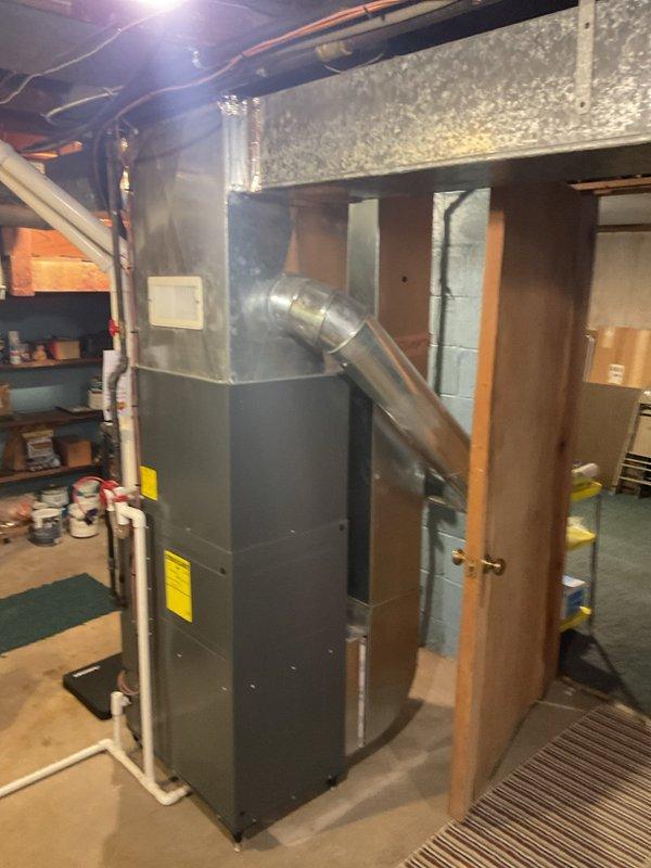 Performed scheduled heating maintenance service on basement-installed furnace system. Inspected and tested all components including connected ductwork, PVC venting, and associated humidifier unit. System is operating within normal parameters with no issues identified.