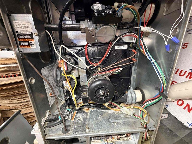 Performed scheduled heating maintenance on a dual-system installation. Inspected furnace interior components including blower motor, electrical connections, and gas valve assembly; all components were found to be in good working condition with no signs of damage or wear. Cleaned and examined blower wheel assembly, confirming proper operation and absence of debris buildup.