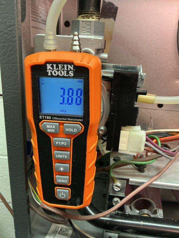 Performed scheduled heating maintenance service on residential furnace system. Conducted differential pressure testing with manometer, obtaining readings of 3.08 indicating proper operation within manufacturer specifications. Inspected complete system including furnace, ductwork, electrical connections, and humidifier, confirming all components are functioning correctly with no issues detected.