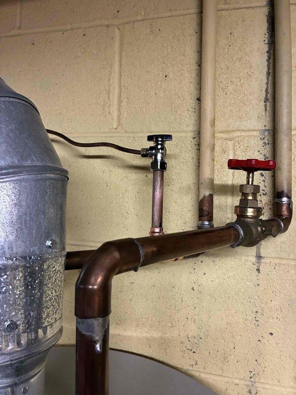 Successfully replaced bypass humidifier system, including installation of new copper supply piping with integrated sight glass and control valve. System was properly soldered at all connection points and tested for proper operation before completion.