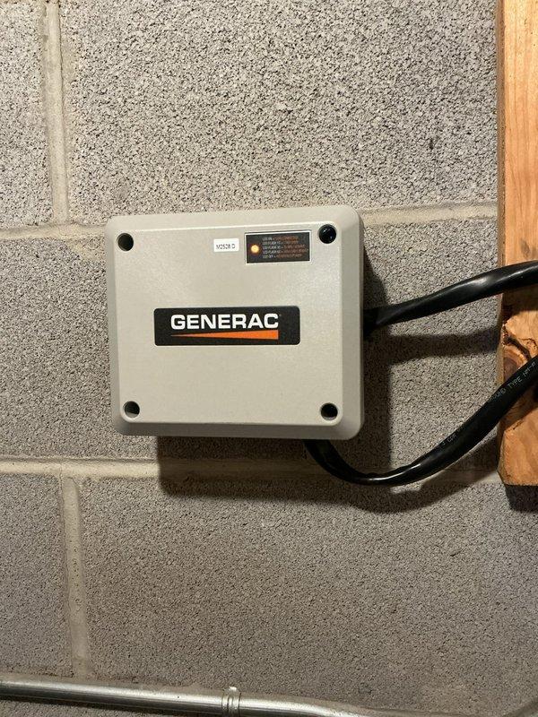 Completed installation of a 22kW Generac generator system with extended warranty. Mounted the Generac transfer switch on cinder block wall with proper conduit connections and prepared the ground area for generator placement. All electrical connections were completed according to manufacturer specifications.