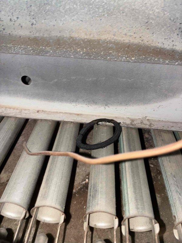 Performed routine boiler maintenance inspection and identified severe corrosion on connecting pipes and fittings. Examined heat exchanger tubes and gaskets which showed normal wear but remain functional. Documented extensive rust deterioration on primary plumbing components that will require replacement during next scheduled service to prevent potential system failure.
