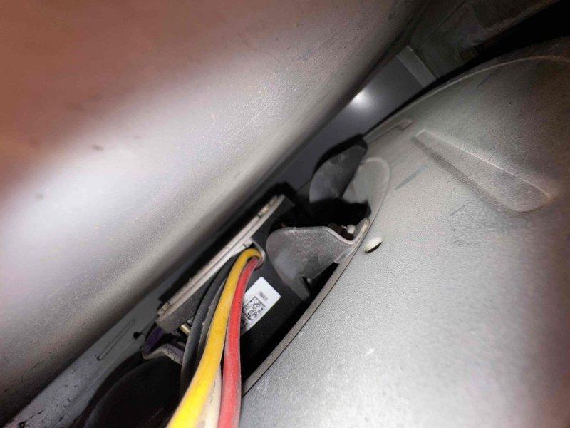 Performed scheduled heating maintenance on furnace system. Inspected internal wiring connections and sensor installation, noting proper placement of control wires (yellow, red). Examined blower assembly and motor components, verifying all electrical connections were secure and functioning correctly.