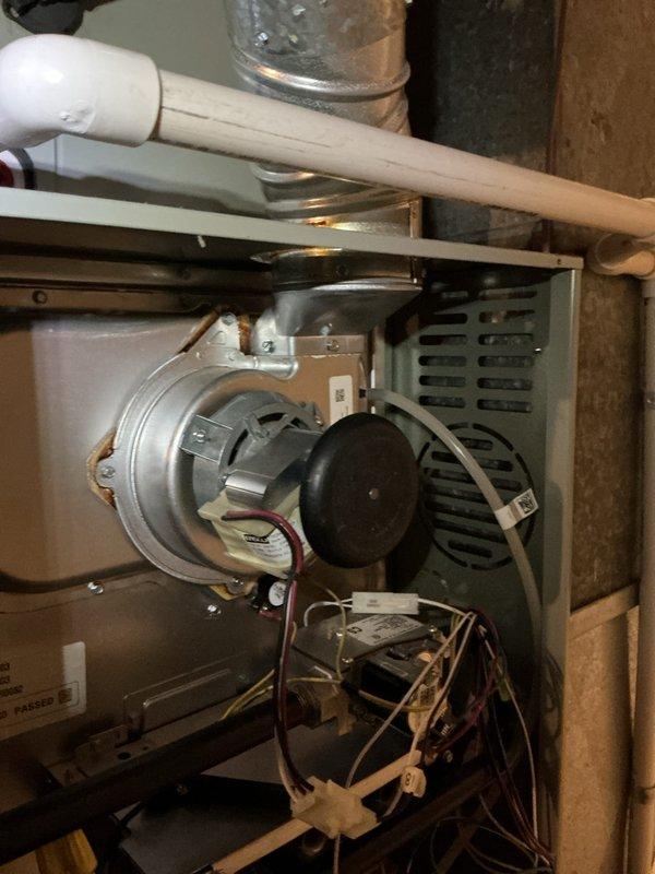 Performed scheduled heating maintenance service on a residential furnace system. Inspected interior components including blower assembly, wiring connections, and drainage system. Replaced air filter and verified proper operation of all system components.