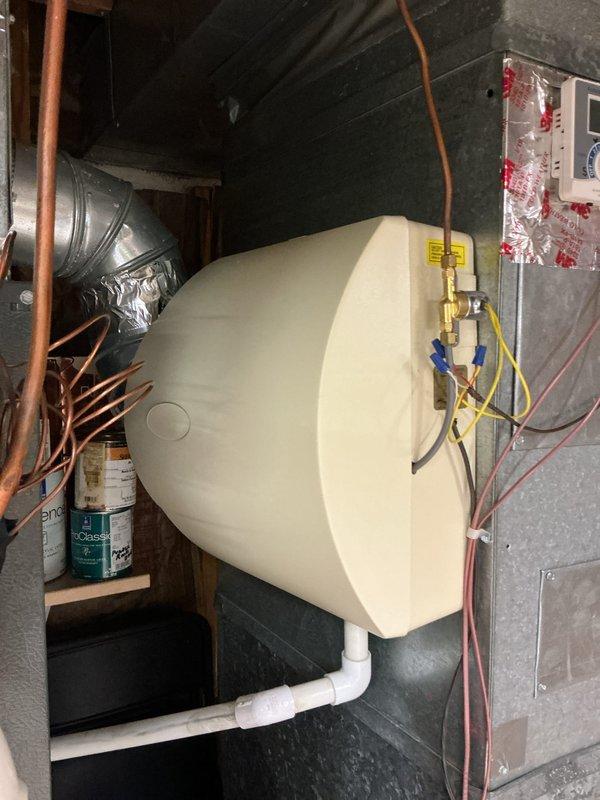 Performed routine maintenance on residential heating system, including inspection of furnace blower motor, electrical connections, and associated ductwork. Examined water heater installation and verified proper operation of control panel/thermostat. All components functioning within normal parameters; no issues requiring remediation were identified.