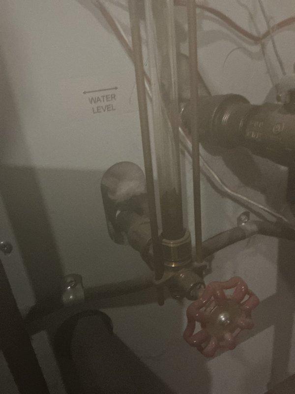 # HVAC Heating Boiler Maintenance Summary

Completed scheduled preventive maintenance service on water boiler system as part of ongoing recurring maintenance program. Performed comprehensive inspection of boiler components, including examination of piping connections, valves, and water level monitoring equipment. Inspected gate valves, brass fittings, and sight glass assembly to ensure proper operation and verify adequate water levels within system parameters. All mechanical components, including metallic piping, connection points, and control valves, were assessed for functionality and signs of wear or corrosion. System operating within normal specifications upon completion of maintenance visit.