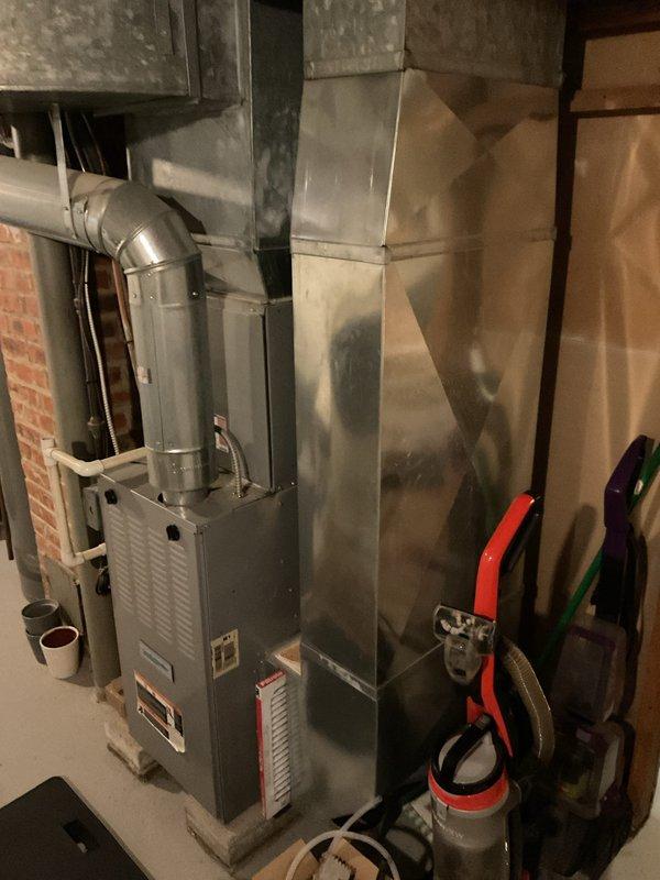# Service Report

Completed comprehensive heating maintenance on residential forced-air furnace system located in basement mechanical room. Performed standard seasonal maintenance protocol including visual inspection of furnace cabinet, ductwork connections, and associated components; verified proper operation of all safety controls and limit switches; checked combustion chamber and heat exchanger for signs of wear or deterioration; inspected and cleaned burner assembly; tested ignition system functionality; examined flue pipe connections and venting system for proper draft and secure attachment; verified condensate drain lines and PVC drainage system for proper flow and clearance; inspected flexible gas connector for leaks and proper installation; tested blower motor operation and airflow; replaced air filter; checked all electrical connections and wiring for signs of damage or loose terminals; verified thermostat communication and system cycling; and confirmed adequate clearances aro