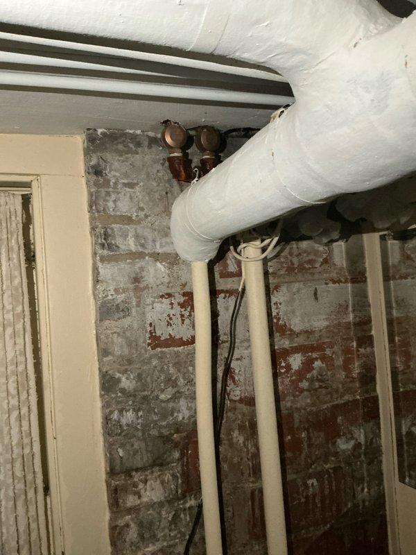 # Boiler Estimate - Failed Heat Exchanger

Responded to service call for non-operational boiler system. Upon inspection, diagnosed failed heat exchanger as primary failure point. System was immediately shut down at thermostat to prevent unsafe operation and potential carbon monoxide hazards. Documented existing equipment condition in basement mechanical space, including aged infrastructure and utility connections. Provided customer with boiler replacement options and recommendations for new equipment installation.