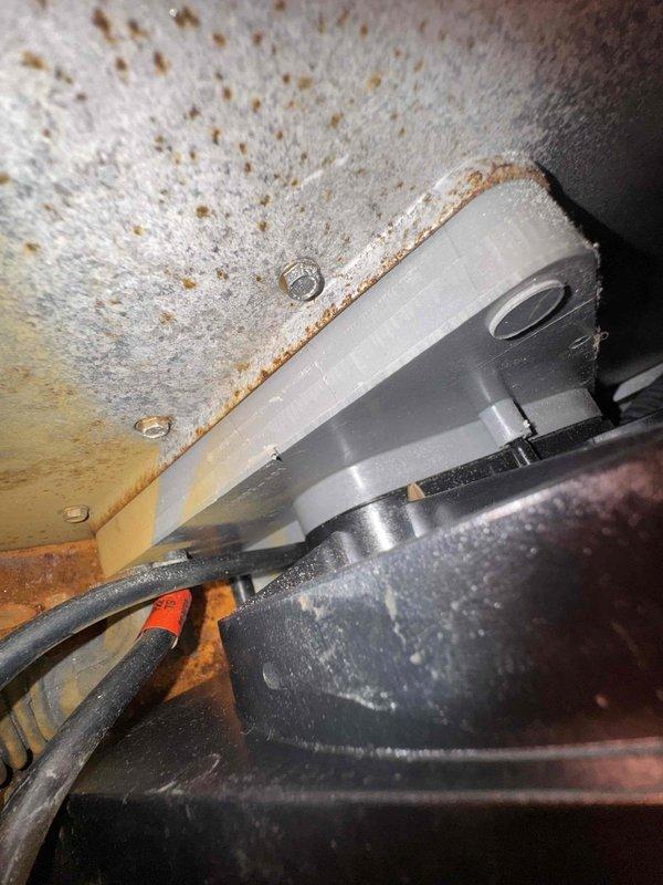 # HVAC Heating Maintenance Service Summary

Completed scheduled preventive maintenance service on residential furnace system as part of ongoing heating maintenance program. Performed comprehensive inspection of blower assembly, verifying proper operation of centrifugal fan wheel and motor shaft alignment. Inspected mechanical mounting components, refrigerant lines, and associated hardware for secure installation and operational integrity. Noted evidence of environmental aging and water staining on surrounding surfaces near equipment installation area, though no immediate impact to system function was observed. All critical components examined and found operational within normal parameters at time of service.