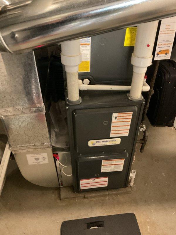 Completed routine heating maintenance on two residential furnace systems. Performed comprehensive inspections of both units including F.E. Wadsworth branded furnace with PVC venting, verifying proper operation of blower motors, heat exchangers, condensate drainage systems, and all safety controls. All equipment found operating within manufacturer specifications with no deficiencies noted.