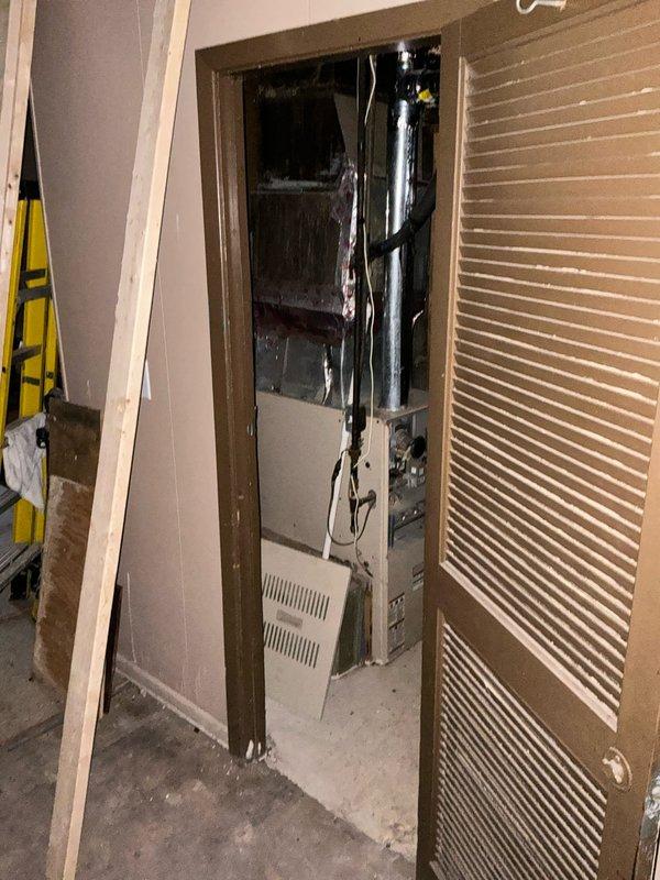 Conducted site assessment for commercial RTU AC replacement quote at multi-story building. Evaluated existing HVAC equipment in mechanical closet including vertical air handler unit and associated ductwork connections, documented equipment specifications and access requirements. Ladder access confirmed as necessary for rooftop unit evaluation, though building height is minimal for standard equipment installation procedures.