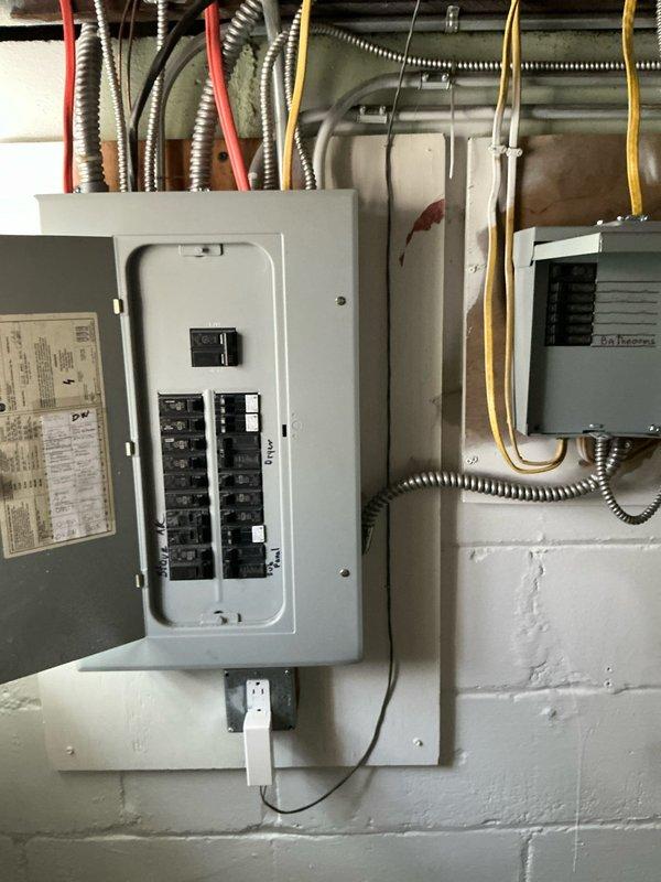 Conducted site assessment for mini split installation options to condition third floor space. Evaluated existing electrical infrastructure including main breaker panel and available capacity for additional HVAC equipment. Documented bedroom layout, dimensions, and mounting locations for indoor air handler unit. Provided customer with multiple system configuration options based on space requirements and electrical service availability.