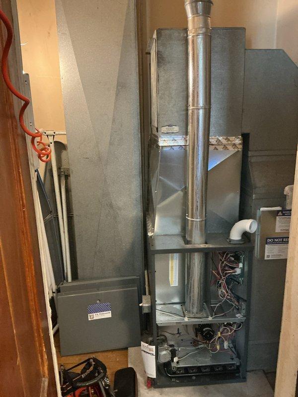 Completed first-year heating maintenance on residential furnace system installed in basement utility area. Performed comprehensive inspection of unit components, verified proper operation of all mechanical and electrical systems, and documented equipment condition through photographic records. All systems found operating within normal parameters with no immediate service needs identified.