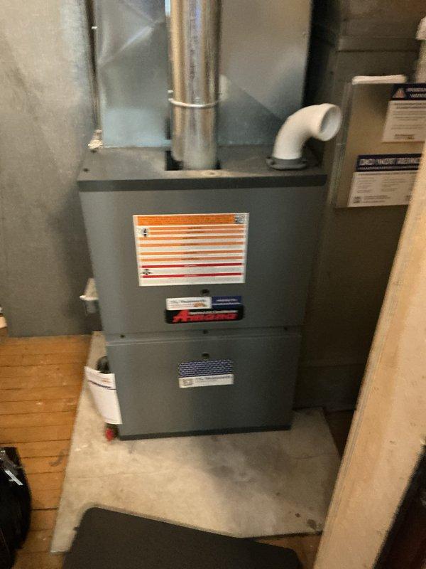 Completed first-year heating maintenance on residential furnace system installed in basement utility area. Performed comprehensive inspection of unit components, verified proper operation of all mechanical and electrical systems, and documented equipment condition through photographic records. All systems found operating within normal parameters with no immediate service needs identified.