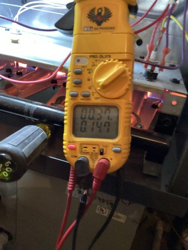 Completed comprehensive heating system maintenance and diagnostics. Performed differential pressure measurements reading 387 using calibration equipment and conducted electrical diagnostics on the control board, measuring voltage readings of 0.031V and 0.746V to verify proper system operation. All components inspected, tested, and confirmed functioning within manufacturer specifications.