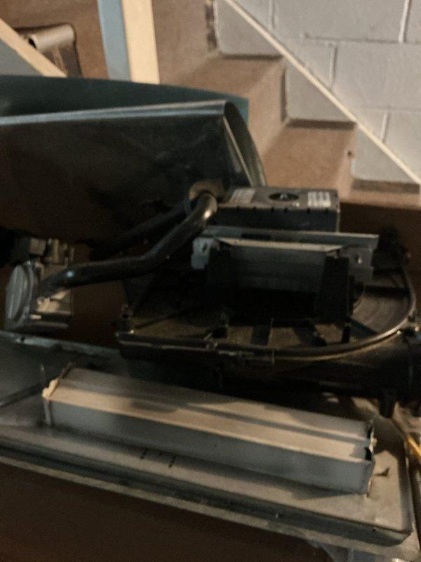 Completed scheduled heating maintenance on Carrier HVAC system, model CNPVP3017ACAABAA, utilizing R-410A refrigerant. Performed comprehensive inspection of air handler unit, including blower motor assembly, heat exchanger components, and evaporator coil. Verified all electrical connections, checked manufacturer specifications against operational parameters, and documented system condition through photographic records. Unit found to be operating within normal parameters with no immediate service requirements identified.