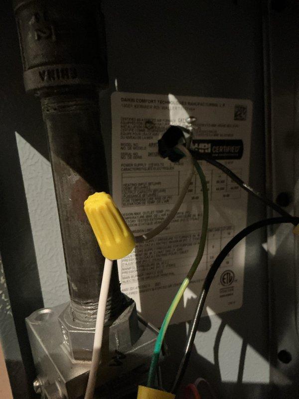 Responded to no-heat call on residential furnace that failed to operate following previous day's service. Upon arrival, performed diagnostic inspection of heating system. Accessed furnace cabinet and examined internal components, wiring connections, and control board assembly. Verified all electrical connections were secure, including wire nut splices and low-voltage wiring to control board. Inspected manufacturer data plate and system specifications. Checked outdoor condensing unit connections and control boards for any issues related to system communication. Identified and resolved issue preventing system operation. Restored power and verified furnace ignition sequence, blower operation, and proper heating cycle. System tested and confirmed operational before departure.