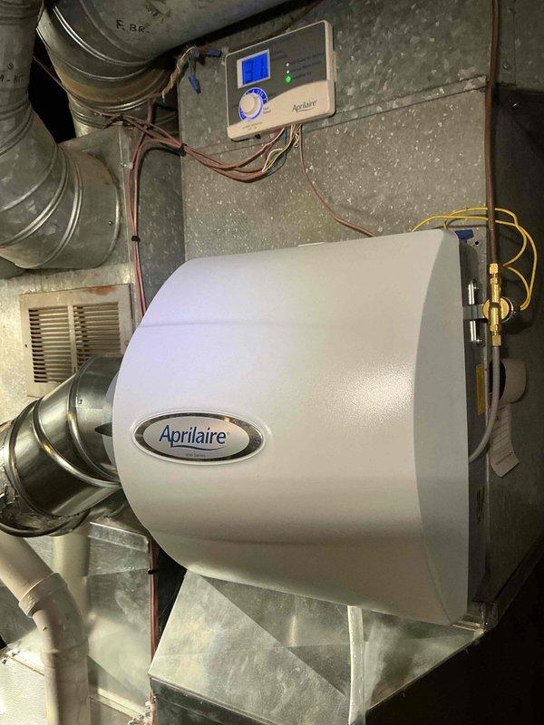 Completed annual heating maintenance visit on furnace system as part of scheduled preventative maintenance program. Performed comprehensive inspection of blower motor assembly, verified proper electrical connections and motor operation, and examined all associated wiring and ductwork connections. Inspected and evaluated Aprilaire whole-house humidifier unit including digital control panel functionality, water supply connections, and humidifier pad condition. All system components found operating within normal parameters with no issues identified requiring immediate attention.