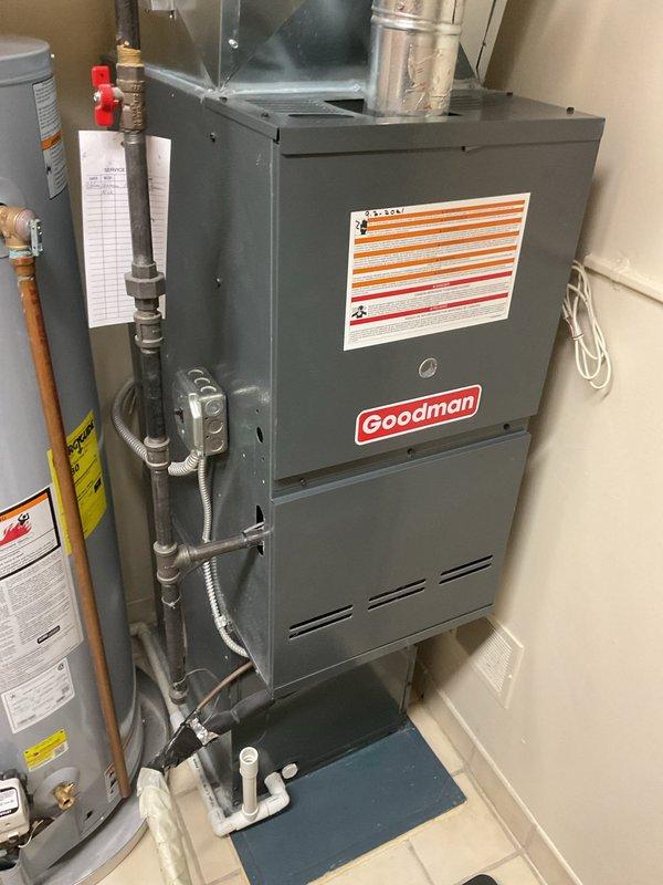 Completed routine heating maintenance on a Goodman residential furnace system. Performed comprehensive inspection of the unit, ductwork connections, gas line assembly with shutoff valve, and associated HVAC components to ensure proper operation and safety compliance. All systems checked and found to be functioning within normal parameters.