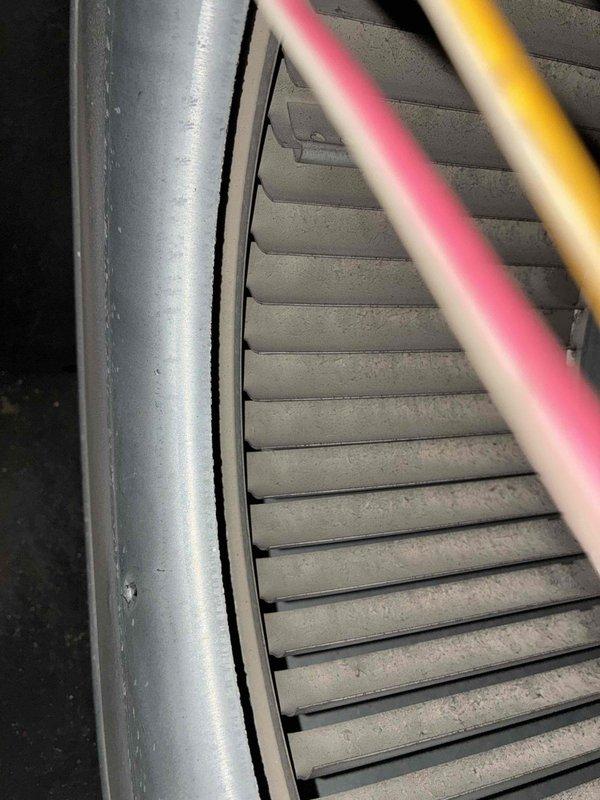 Completed scheduled heating maintenance inspection on HVAC system. Performed visual inspection of ductwork and air return components, documenting condition of return air grille which showed moderate dust accumulation on horizontal slats and surrounding ductwork. System operational and accessible for routine maintenance procedures.