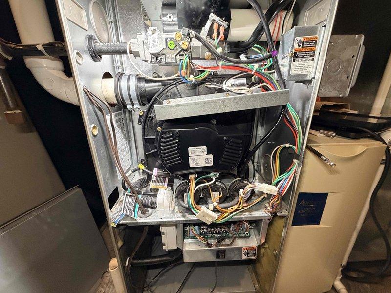 Performed comprehensive heating maintenance on residential HVAC system, including thorough inspection of furnace components, gas valve assembly, electrical connections, and blower motor operation. Documented system condition and confirmed Aprilaire Model 2200 Media Air Cleaner installation, verifying all components are functioning properly and unit is operating within manufacturer specifications.