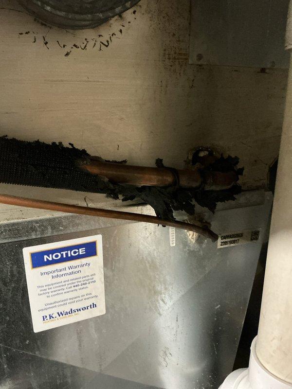 # HVAC Heating Maintenance Completed

Performed comprehensive heating system maintenance on residential HVAC air handler unit located in basement utility area. Conducted thorough inspection of equipment, including visual assessment of unit exterior, internal components, and surrounding infrastructure. Examined copper refrigerant lines, ductwork connections, and drainage system for proper operation and potential issues. Noted existing insulation deterioration on overhead ductwork that may require future attention for optimal system efficiency. Verified warranty documentation on unit and confirmed all accessible components were functioning within normal parameters. System operational and ready for continued service.