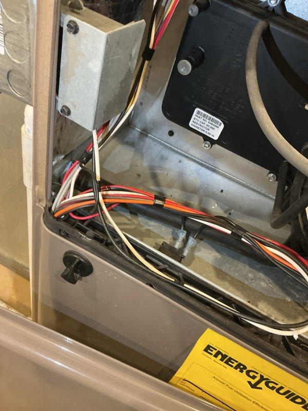 # HVAC Heating System Maintenance

Performed comprehensive heating maintenance on residential HVAC system. Conducted thorough inspection of furnace internal components, including blower motor assembly, electrical connections, and control switches. Verified all wire connections at terminal points, examined fan speed control switch (LO/H positions) for proper operation, and inspected safety switches and relays. Checked integrity of foam insulation within cabinet housing, confirmed secure mounting of all electrical components and brackets, and verified energy efficiency labeling remained intact. All electrical connections tested and found secure with no signs of overheating or deterioration. System operational and ready for heating season.