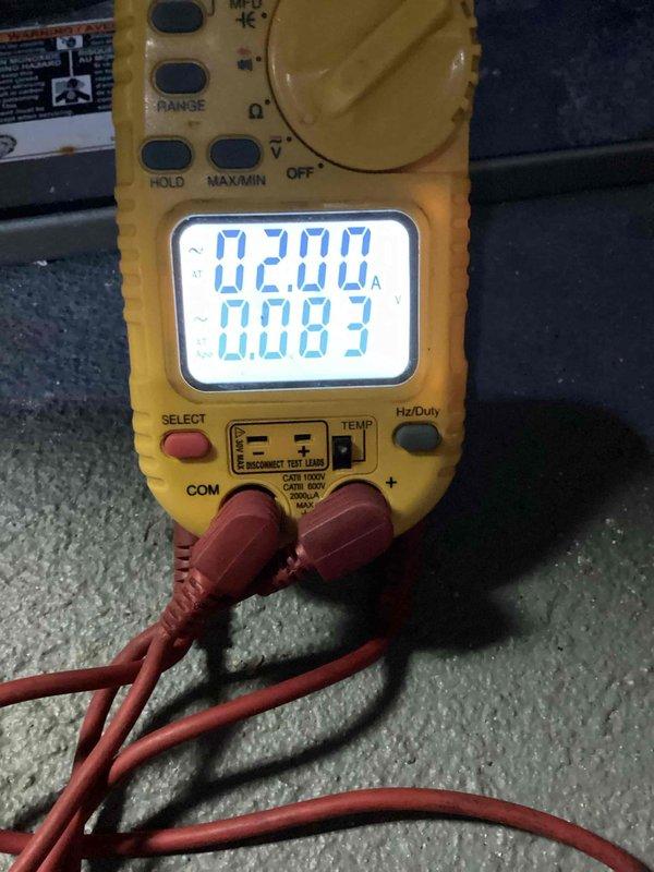 Completed scheduled heating maintenance on residential furnace system. Performed comprehensive system diagnostics using digital multimeter to verify electrical readings and component functionality. Inspected blower motor assembly, electrical connections, and all internal components with access panel removed. Verified proper operation of all safety controls and measured voltage levels throughout the system to ensure optimal performance and safe operation.