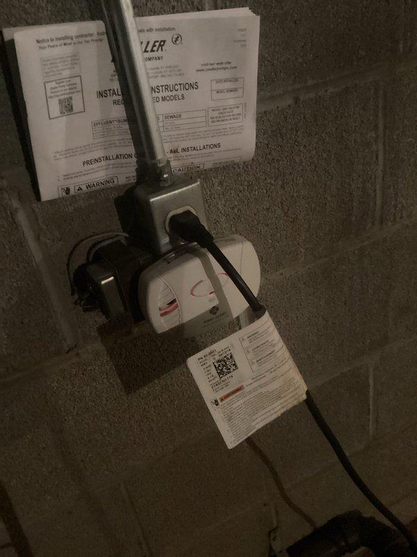 Installed radon mitigation system in basement utility area, including mounting fan unit on concrete block wall and routing electrical wiring to dedicated outlet. Installed GFCI outlet protection device in living space to provide ground fault protection for connected equipment.