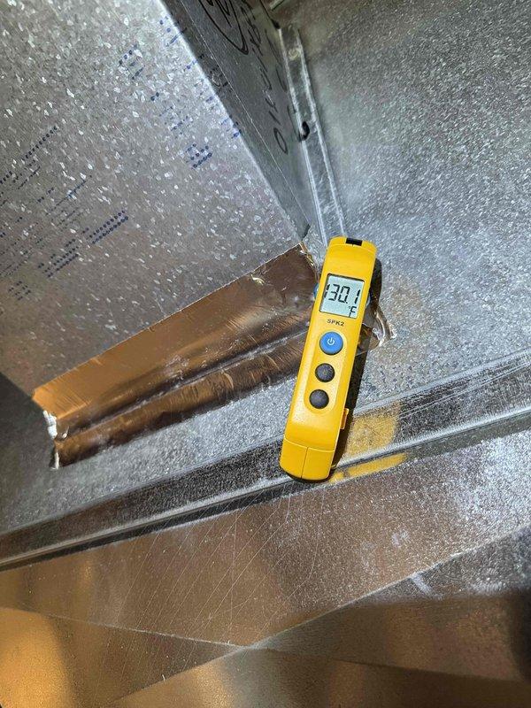 Completed comprehensive 5-year preventive maintenance inspection on residential furnace and HVAC system. Performed diagnostic measurements on air handler unit, verified proper temperature readings at 30.1°F on refrigerant lines, inspected ductwork insulation and copper piping for integrity, and confirmed all mechanical components including dual water heaters and furnace unit were operating within manufacturer specifications with proper ventilation and support structures intact.