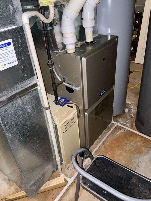 Conducted on-site assessment of existing Carrier HVAC system in residential basement to provide equipment replacement options. Evaluated aging furnace, air handler, and associated ductwork and venting components. Documented current system configuration including PVC venting, gas connections, and electrical setup. Prepared comprehensive quotes for furnace-only replacement as well as complete system upgrade options.