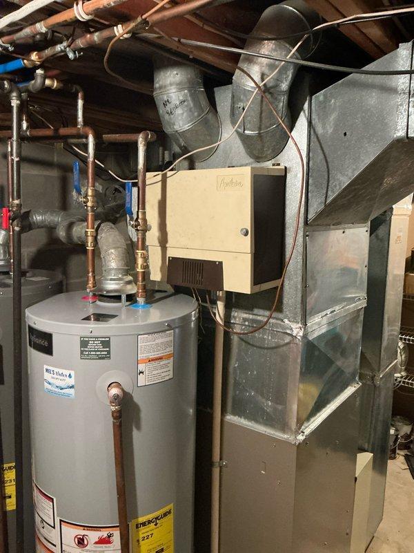 Conducted on-site assessment of existing Carrier HVAC system in residential basement to provide equipment replacement options. Evaluated aging furnace, air handler, and associated ductwork and venting components. Documented current system configuration including PVC venting, gas connections, and electrical setup. Prepared comprehensive quotes for furnace-only replacement as well as complete system upgrade options.