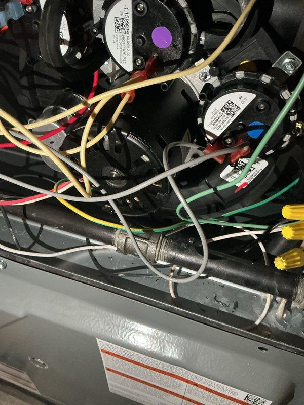 Completed annual heating maintenance on residential HVAC system. Performed comprehensive inspection of furnace components including blower motor assemblies, electrical connections, and safety controls. Verified proper operation of Aprilaire humidifier unit and associated ductwork connections. Inspected all wiring harnesses, confirmed secure connections with wire nuts, and checked motor mounting hardware for proper torque. Examined refrigerant line insulation, flexible conduit routing, and metal ductwork for any signs of wear or deterioration. All components found operating within manufacturer specifications with no immediate repairs required.