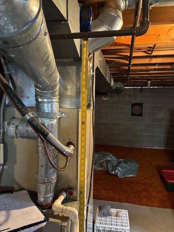 Conducted on-site assessment of 32-year-old furnace system to provide replacement options. Documented existing HVAC infrastructure including ductwork configuration, electrical service connections, and basement mechanical room layout to determine specifications for new equipment installation.