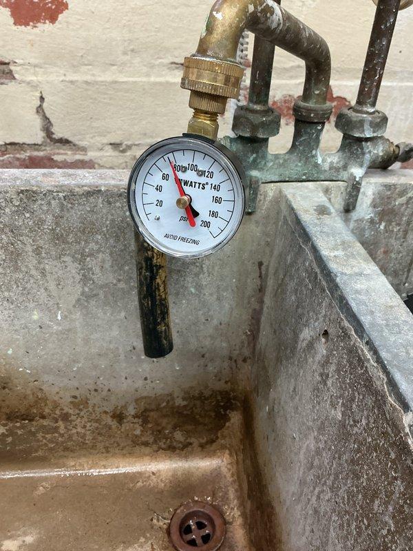 Completed routine water heater maintenance flush on tanked unit equipped with Unitrol gas control valve. Drained sediment from tank through drain valve into utility sink, inspected pressure relief valve and gauge reading within normal operating range, and verified proper operation of gas control assembly and pilot light system. All components including temperature controls, thermocouple connections, and plumbing connections found in satisfactory working condition with no leaks detected upon completion of flush procedure.