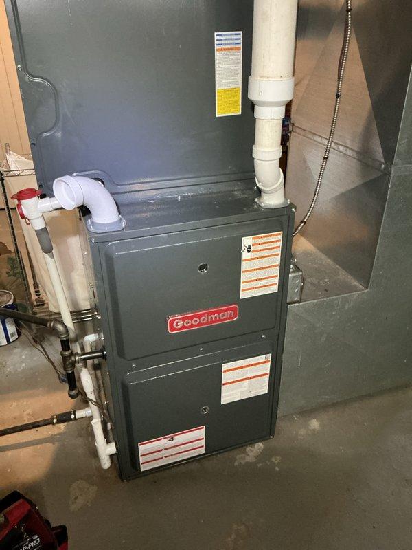 Performed comprehensive heating maintenance on Goodman brand gas furnace system. Conducted thorough inspection of internal components including blower motor assembly, heat exchanger, burner assembly, and control board. Verified proper operation of all electrical connections and wiring harnesses. Inspected PVC venting system for proper drainage and secure connections. All components found to be functioning within normal operating parameters and system cleared for continued operation.