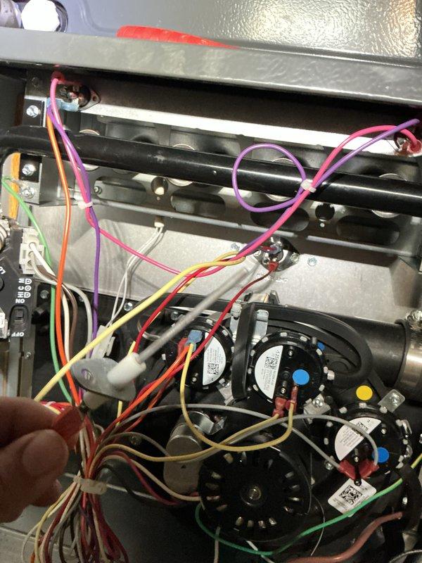 Performed comprehensive heating maintenance on Goodman brand gas furnace system. Conducted thorough inspection of internal components including blower motor assembly, heat exchanger, burner assembly, and control board. Verified proper operation of all electrical connections and wiring harnesses. Inspected PVC venting system for proper drainage and secure connections. All components found to be functioning within normal operating parameters and system cleared for continued operation.