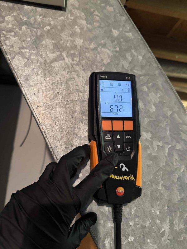 Completed first-year preventative maintenance on residential gas furnace system per annual service plan agreement. Performed comprehensive system inspection with furnace cabinet fully opened to access all internal components. Conducted combustion analysis testing using calibrated digital analyzer, recording temperature and combustion efficiency readings to verify proper burner operation and heat exchanger performance. Visually inspected all major components including blower motor assembly, heat exchanger tubes, pressure switches, control board, and electrical connections. Verified all wire terminations were secure and circuit board showed no signs of damage or overheating. Confirmed blower motor operation and airflow through system. Checked condensate drainage system and PVC venting for proper installation and function. All components found operating within manufacturer specifications with no deficiencies noted. System tested and left in proper working order.