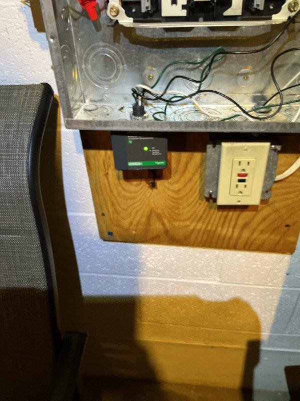 Completed electrical work associated with furnace installation, including circuit breaker panel modifications and low-voltage control wiring. Installed dedicated circuit protection in main electrical panel with appropriate wire routing and connections. Ran and terminated control wiring for furnace operation, including installation of control module with LED status indicators and GFCI-protected receptacle at equipment location. Verified proper grounding, secured all wiring connections, and confirmed system functionality with indicator lights showing active status.